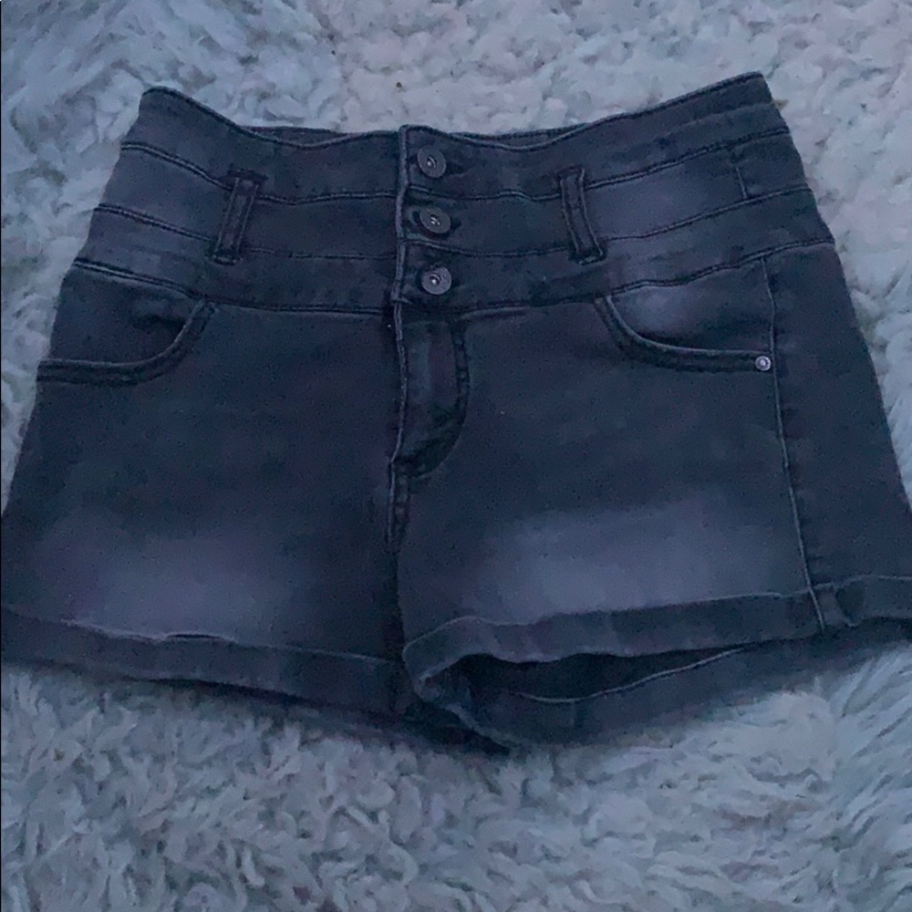 black and grey jean shorts.
